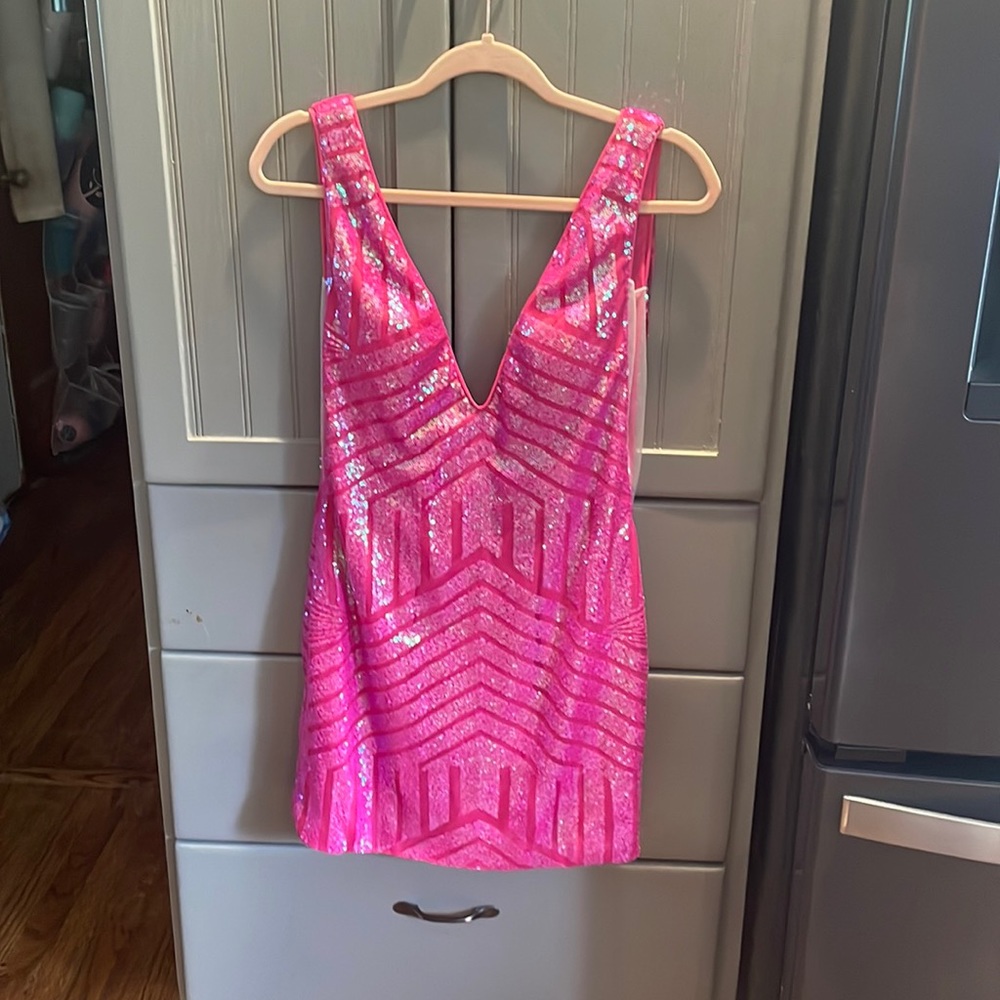 I am selling a brand new homecoming dress.